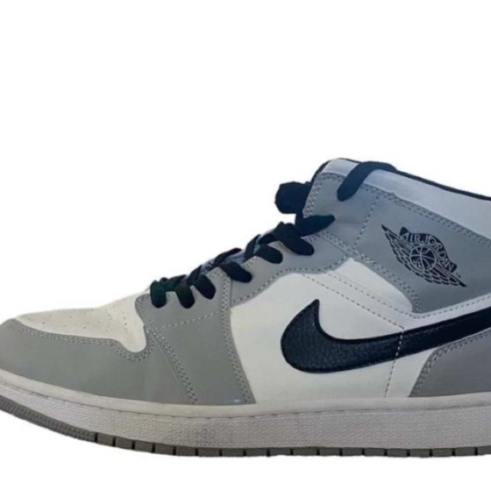 White and grey mid jordan 1